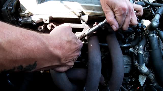 HOW TO INSTALL TOYOTA MR2 EXHAUST MANIFOLD AND THERMOSTAT HOUSING PART 2