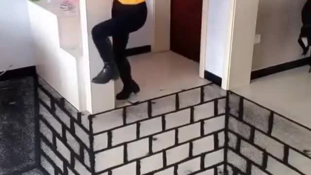 a husband pranks his wife in front of the room