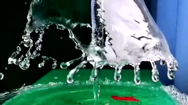 exploding balloon in slow motion