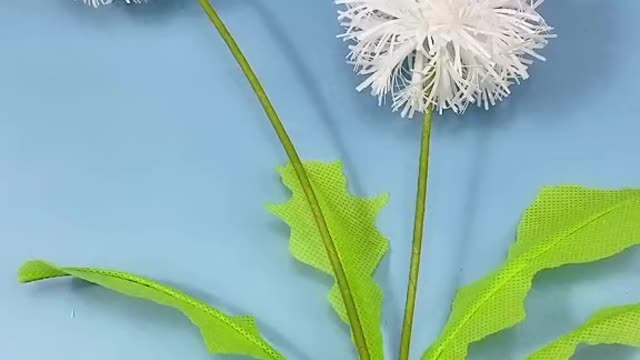 Dandelion made of plastic straw