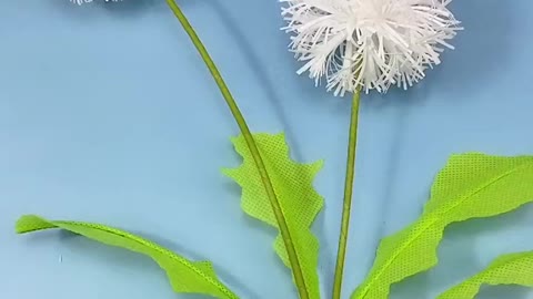 Dandelion made of plastic straw