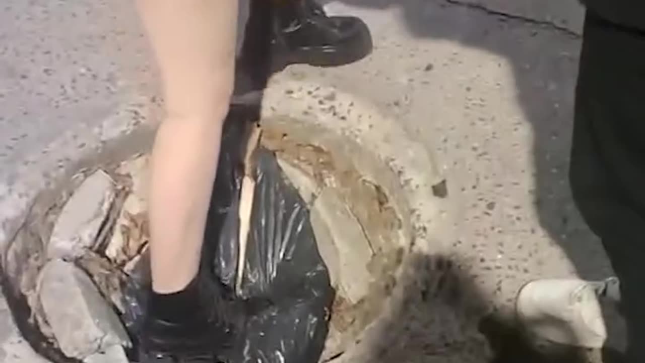 Lad falls through hole in the ground