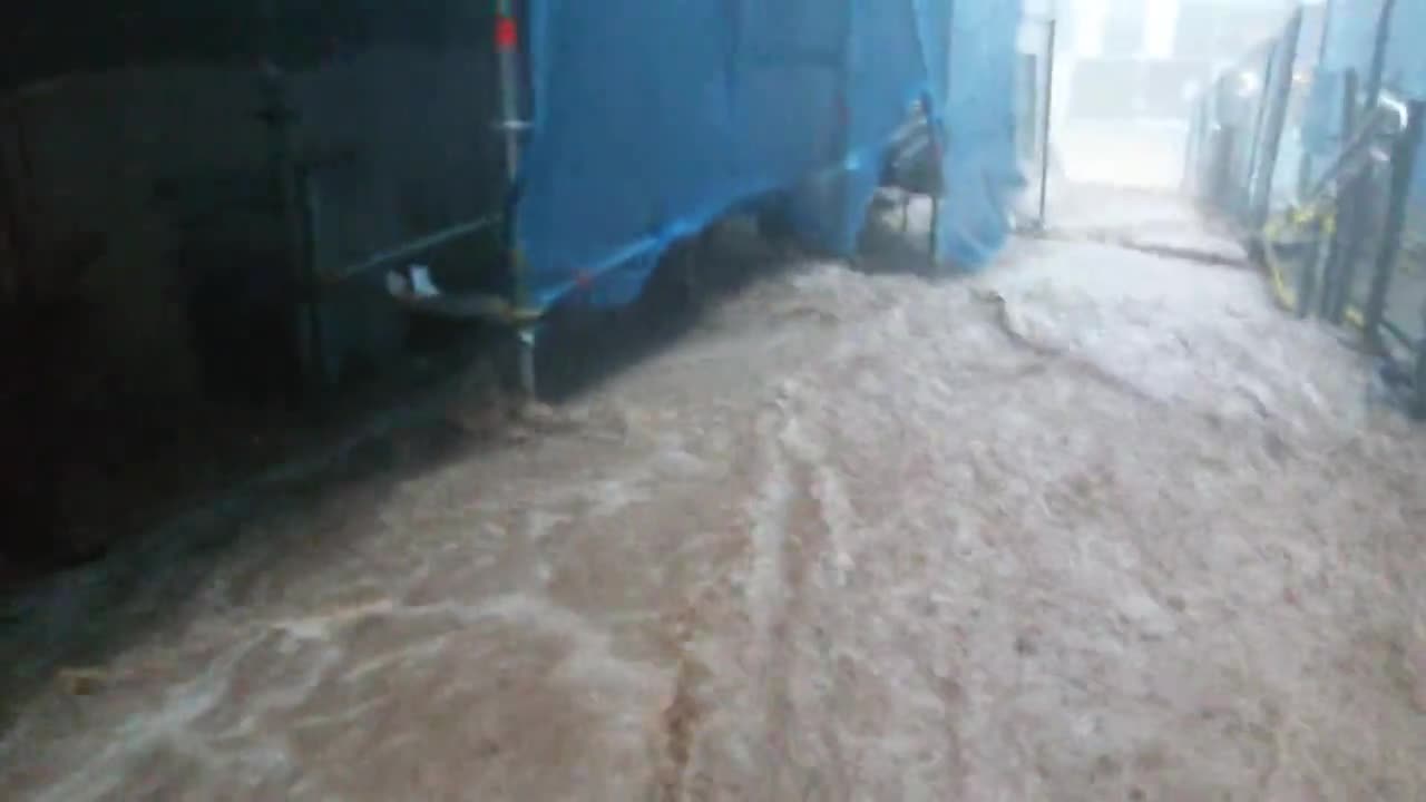 Stairs become a "waterfall" after intense flood in Estonia