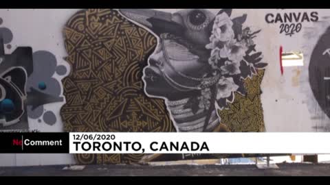 Toronto graffiti artists "paint the city black" against racism