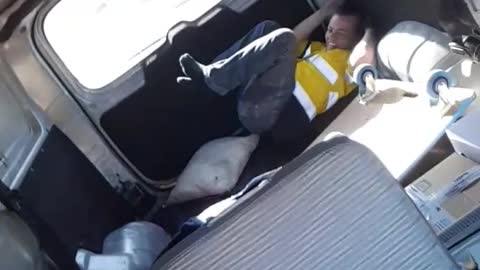 Man Slips out of Moving Van during Turn