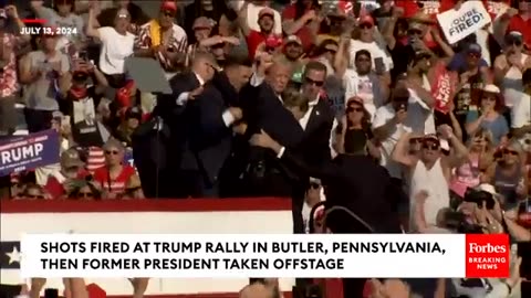 Shots Fired At Trump Rally, Injured Former President Pumps Fist As He's Rushed Off Stage