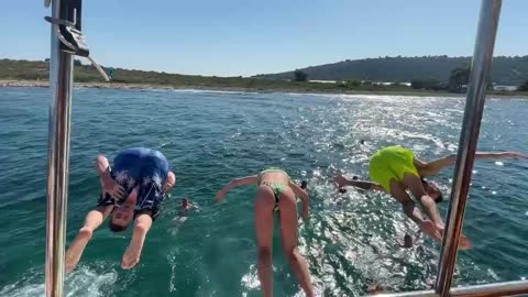 Flip from a boat with friends
