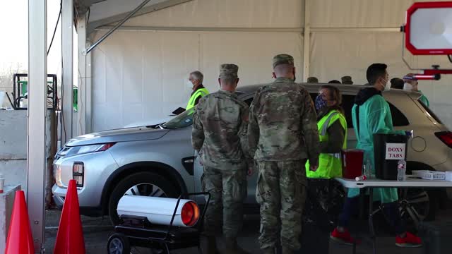 U.S. Army Soldiers shadow medical workers at COVID-19 Community Vaccination Center