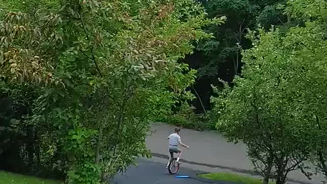 Unicycling down the driveway