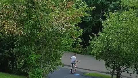 Unicycling down the driveway