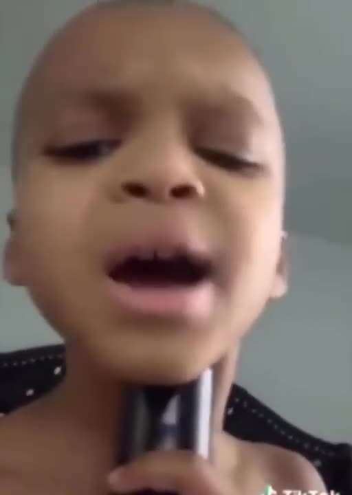 Kid uses grandmas voice box for auto tune