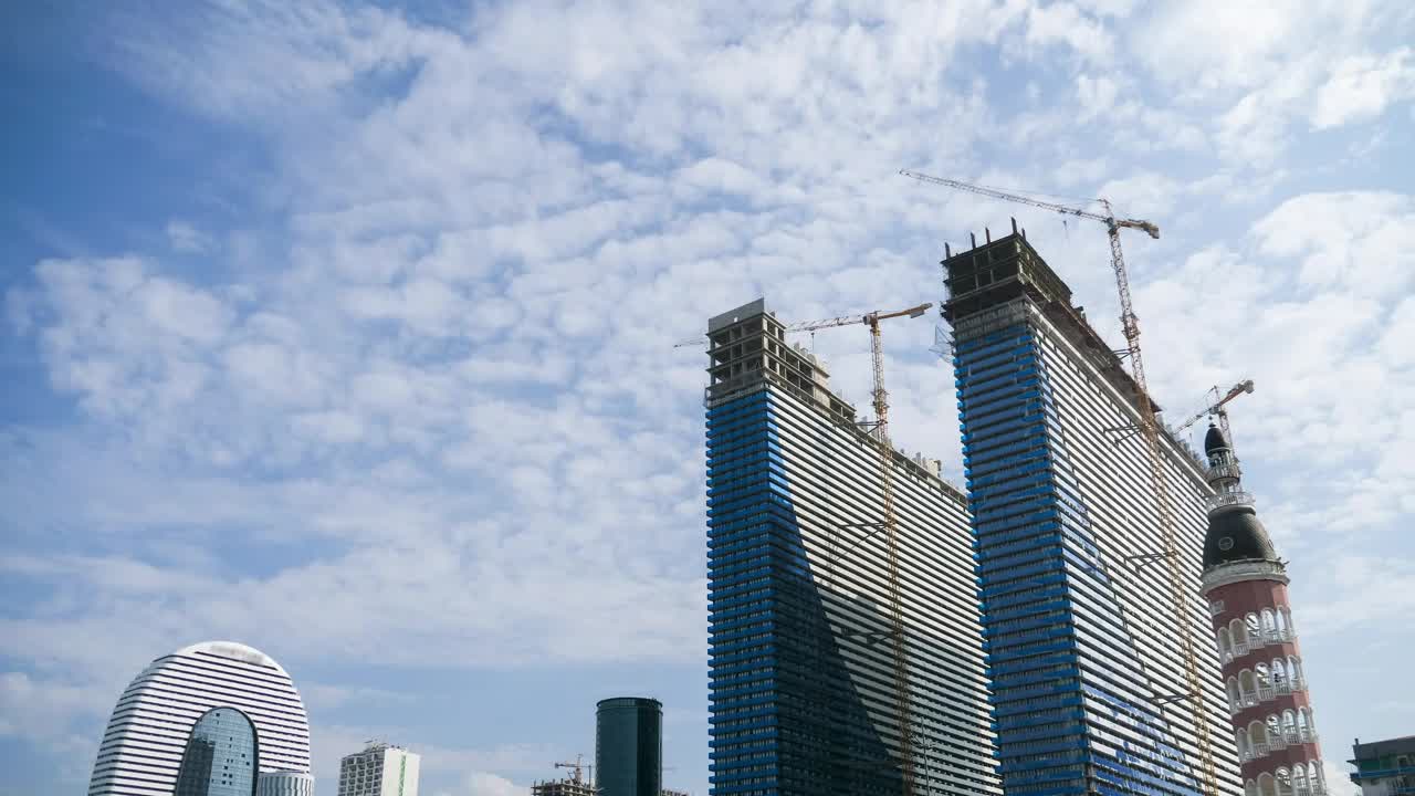 Modern skyscrapers under construction