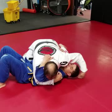 Bread cutter choke, to armbar