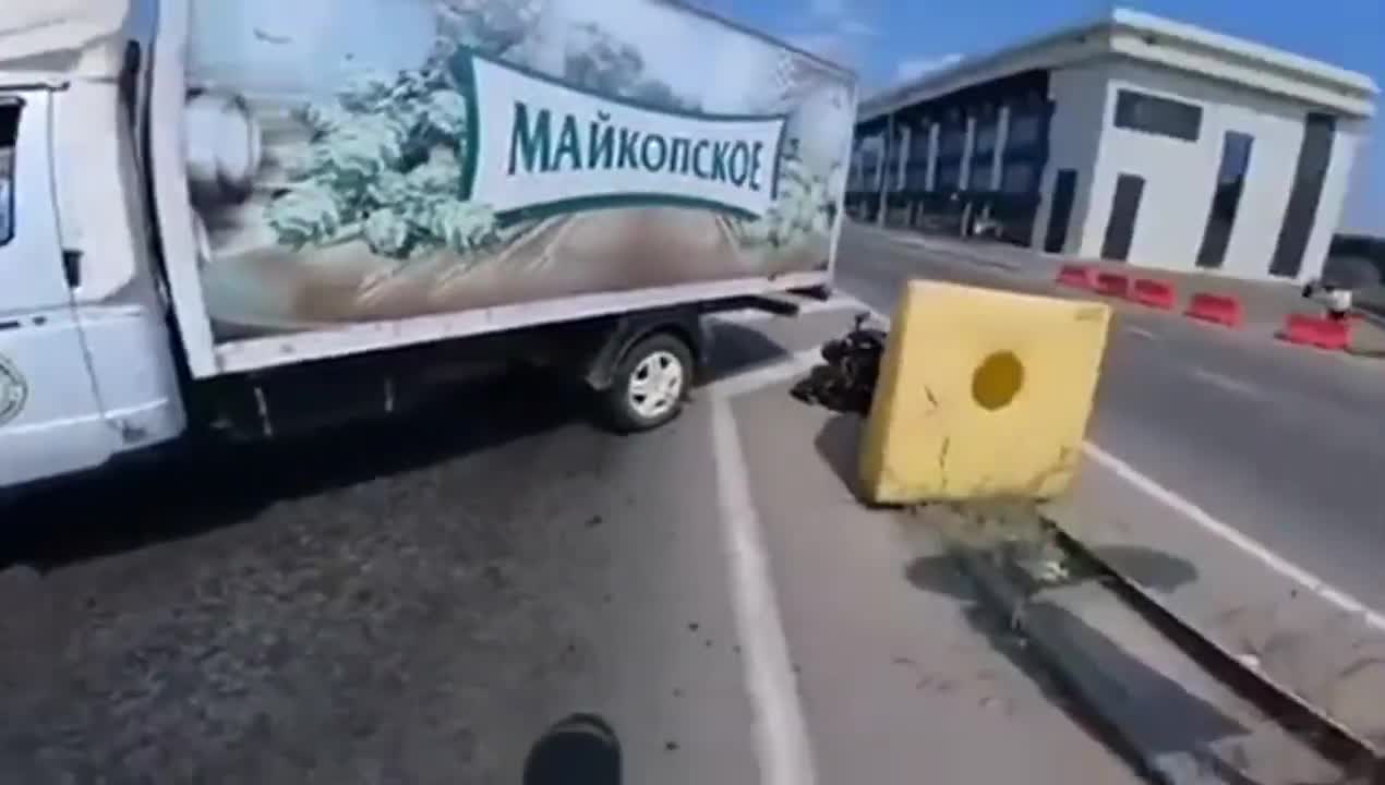 A motorcycle collides with a van that has turned into his path