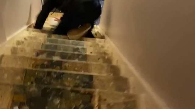 Scared Boyfriend Tumbles down Stairs