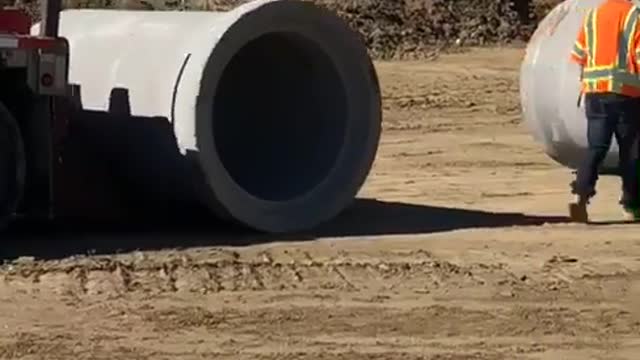 Satisfying Way to Unload Reinforced Concrete Pipes