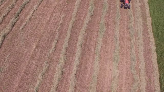 QUINTON WORKS ON FARM IN WI