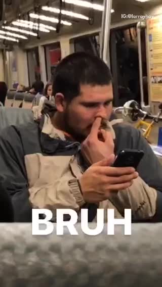 Bruh guy picks nose very aggressively on train