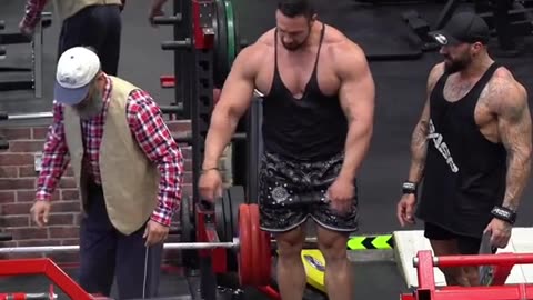 Grandpa stopped from carrying heavy weights in Gym