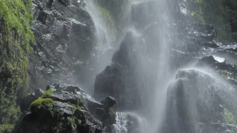 Water falling over stones