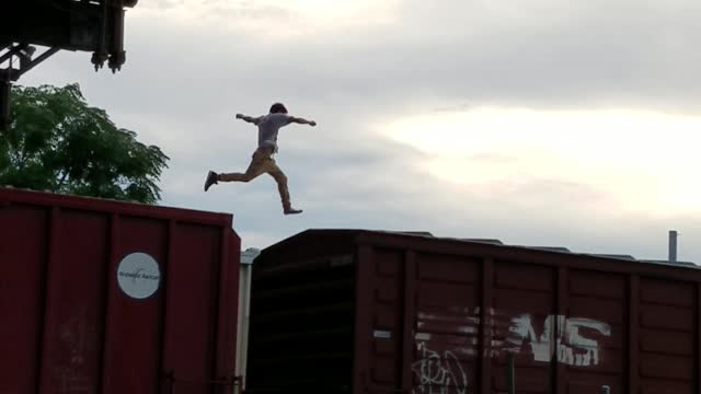 Guy Runs on Top of Train