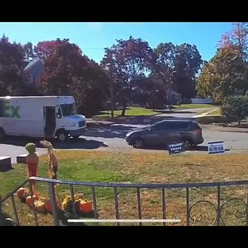 FedEx drivers intentionally mishandling packages at a house with Trump yard signs.