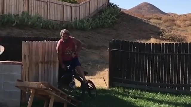 Collab copyright protection - red shirt dad bike ramp faceplant