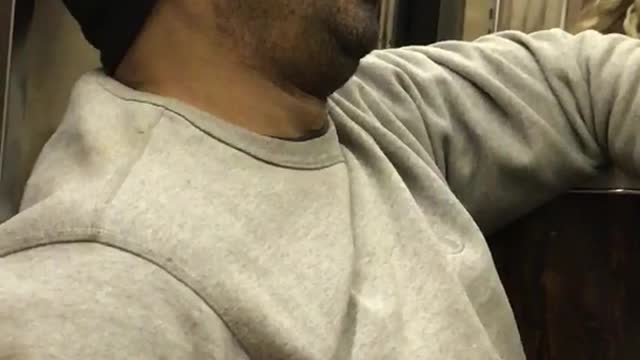 Sleeping beanie guy with hand in pocket snores on subway