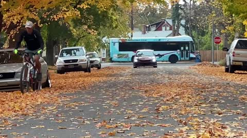 Driver Looking for Photo Shoot Startles Passing Cyclist