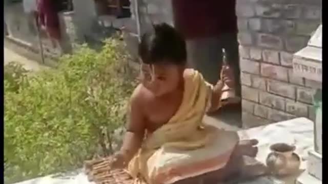 Indian kid is a priest