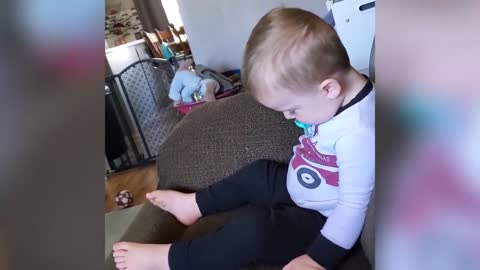 Cute Funny Babies playing video