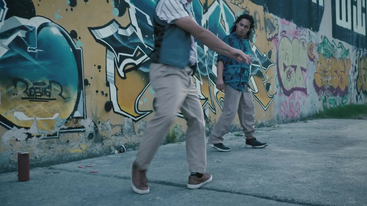 Two young men in a dance duel