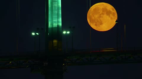 The very big moon moved slowly