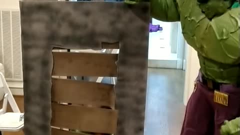 Green Goliath hulk teaches how to bust through a wooden wall at a birthday party in Houston Texas