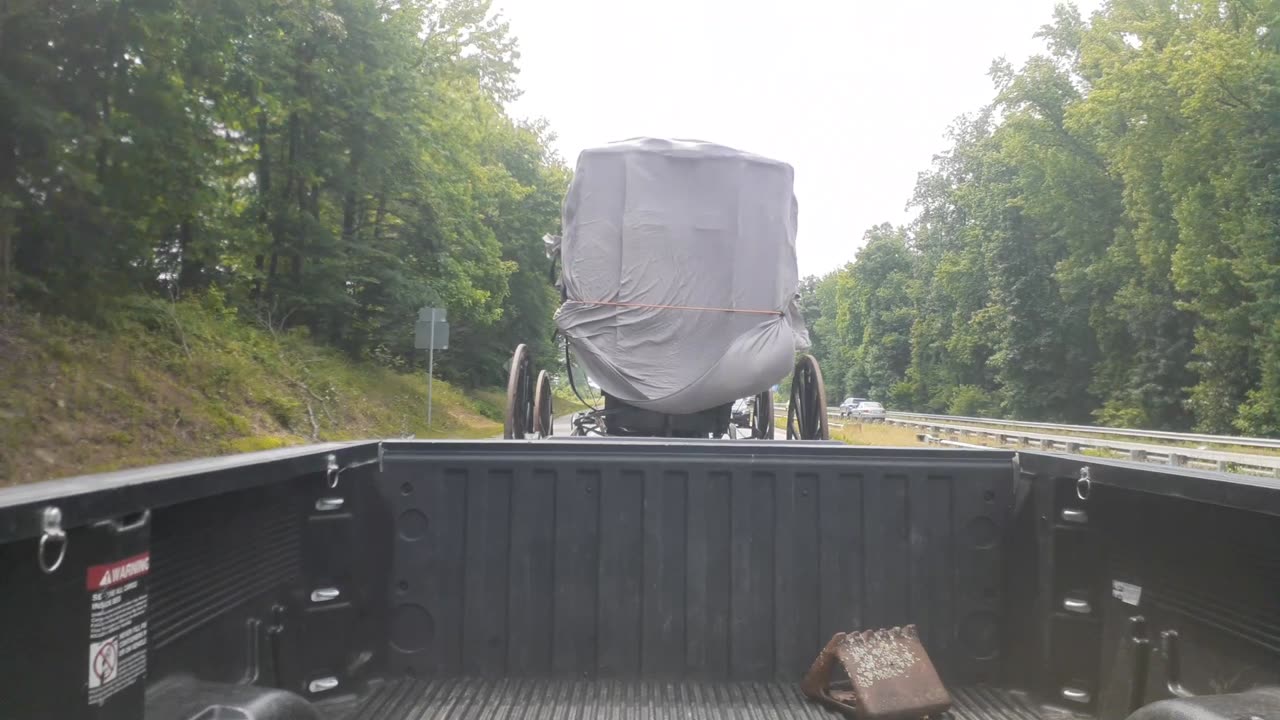 Towing an Amish buggy