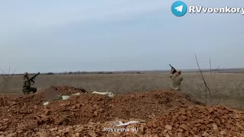 Russian troops shoot down a Ukrainian drone with AK74's