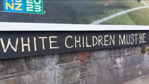 Tranz Sign outside a train station in Cork, Ireland! - "Attack Christians & White Children!"