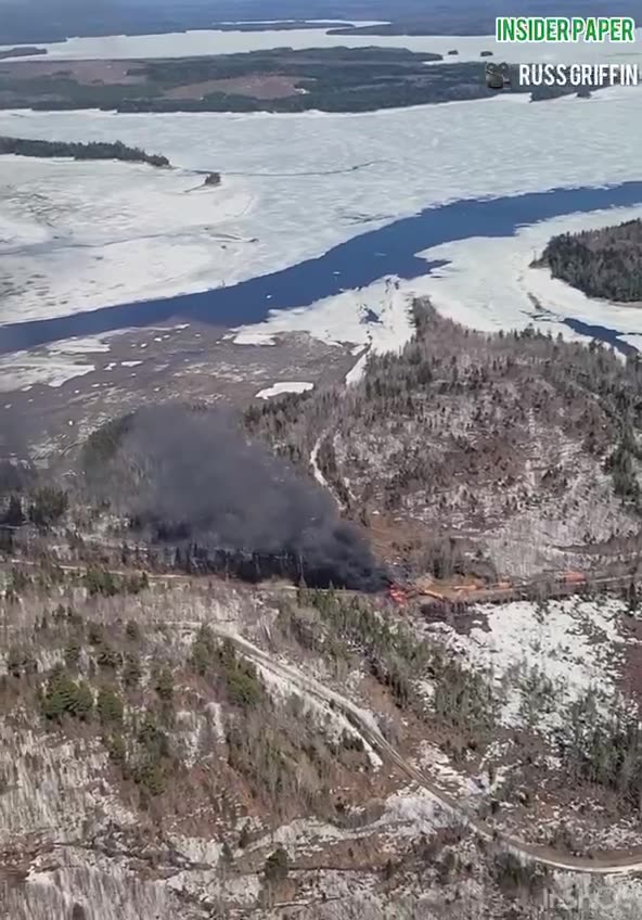 Train carrying potentially hazardous materials derailed and caught fire near Rockwood, Maine