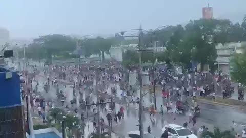 Protesters take over the streets in Puerto La Cruz in Venezuela after President