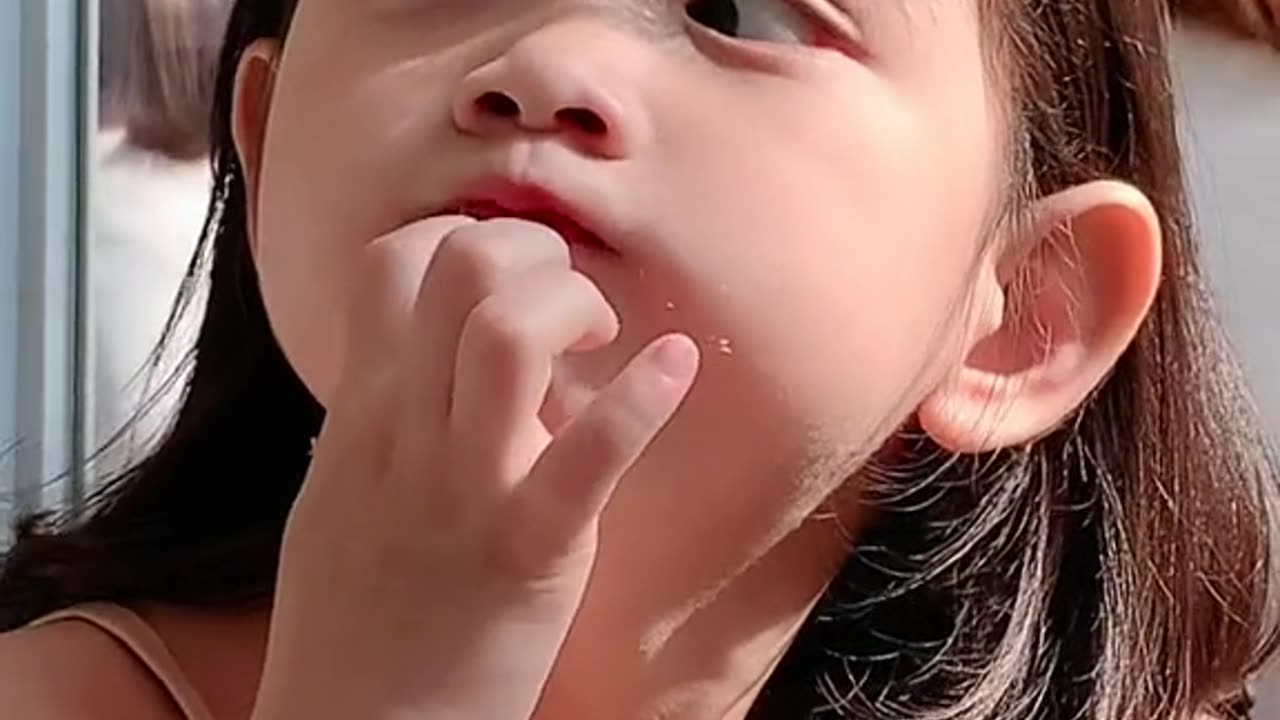 cute baby eating bread