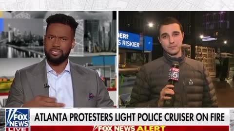 Atlanta protestors light police cruiser on Fire