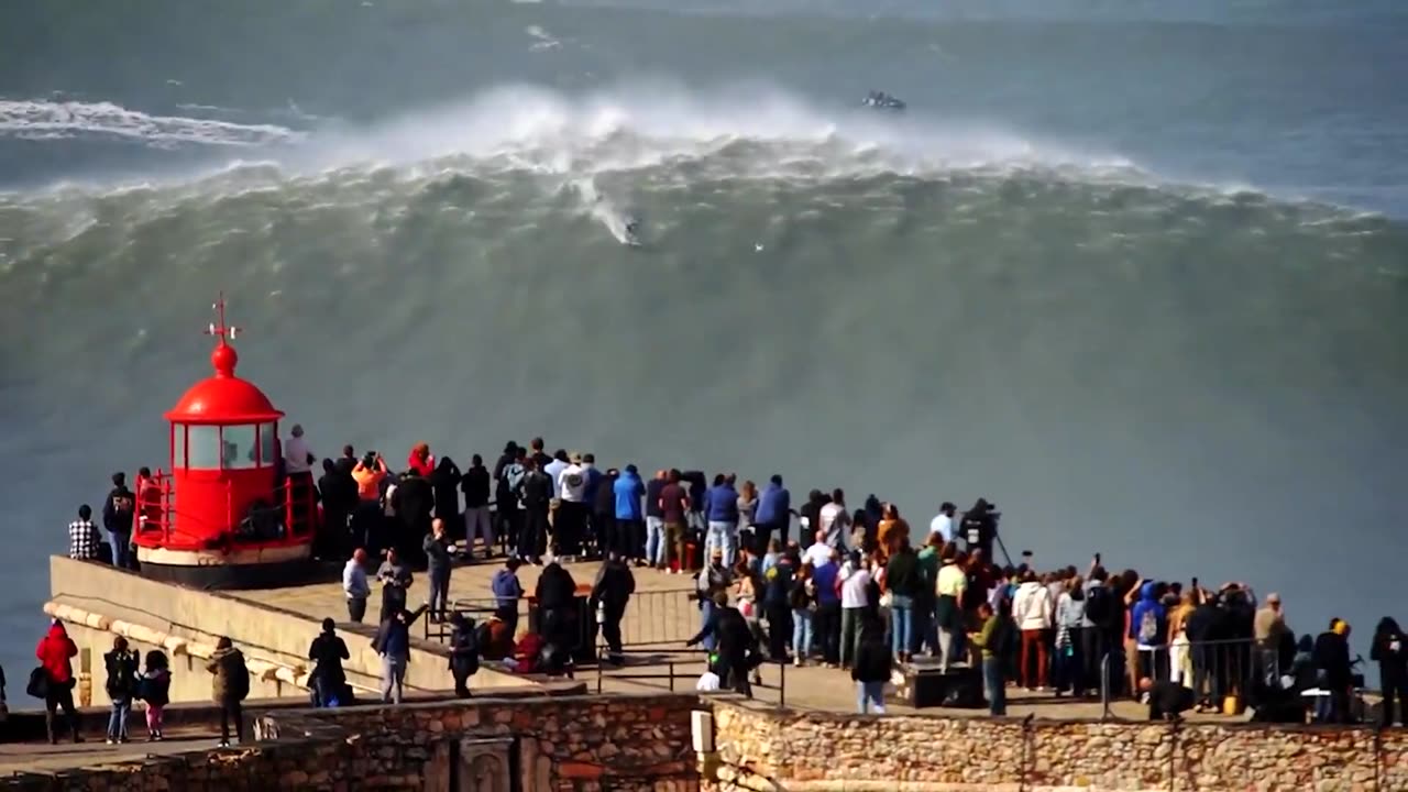 Surfing Huge Nazare Waves / Portugal