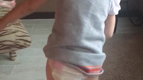 Toddler saying good bye