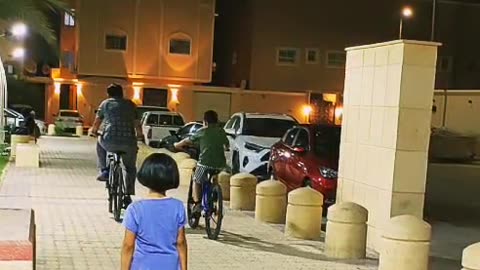 Son and father cycling