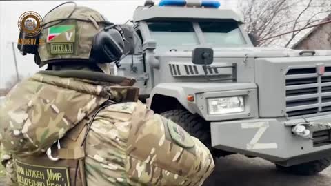 Chechen OMON riot police work to clear a populated area in the Zaporozhye region