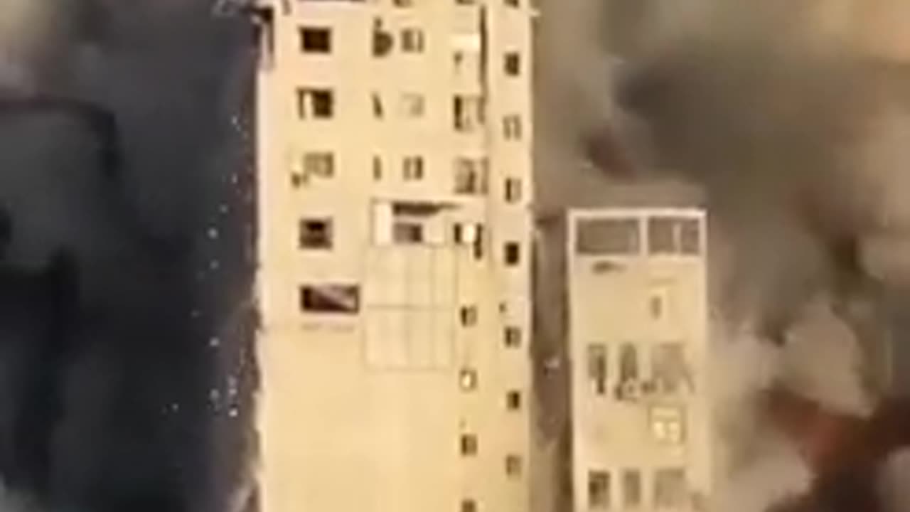 Israeli Air Strike - Building Collapses After Missile attack