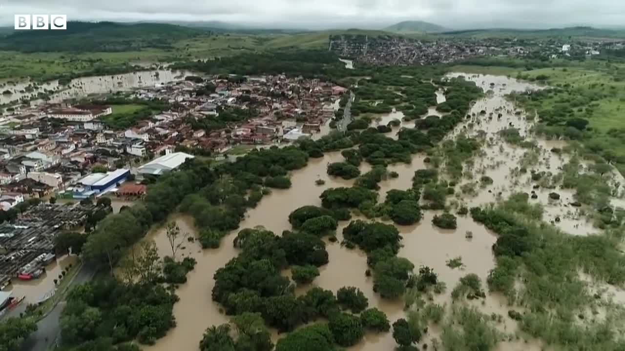 Dams burst in Brazil as deadly flooding continues - BBC News