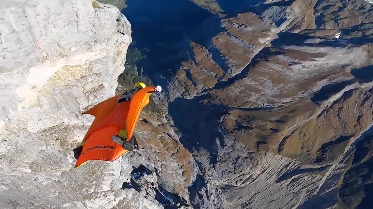 RidgeMonster.com Douggs WingSuit pilot flying Eiger Mountain Switzerland & camer