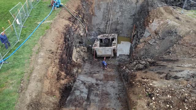 Watch as A 26-foot-long Buffalo LVT is extracted from the earth in Crowland