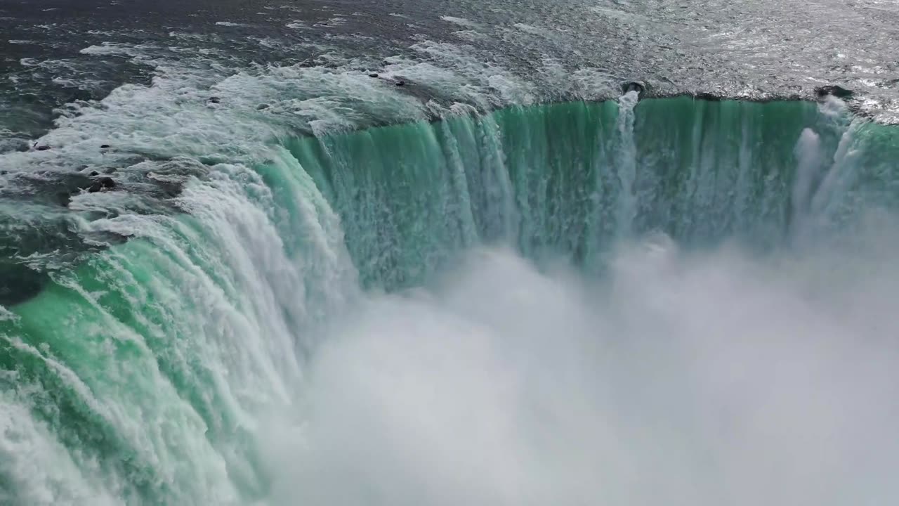 big waterfall and sea